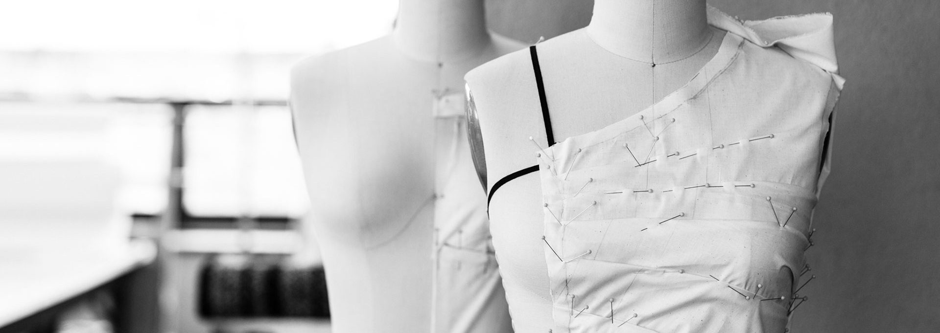 Apparel draping on sewing mannequins in the Fashion Arts Collective Workroom